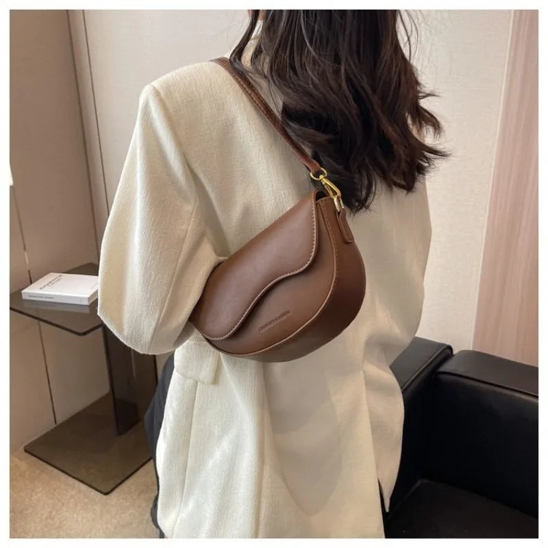 Claire half-moon shoulder bag
