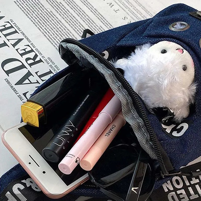 sac banane bleu foncé avec peluche Aurore